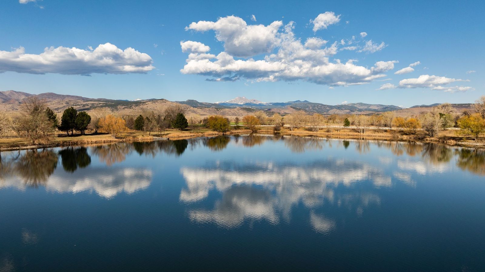 The private lake with mountain reflections